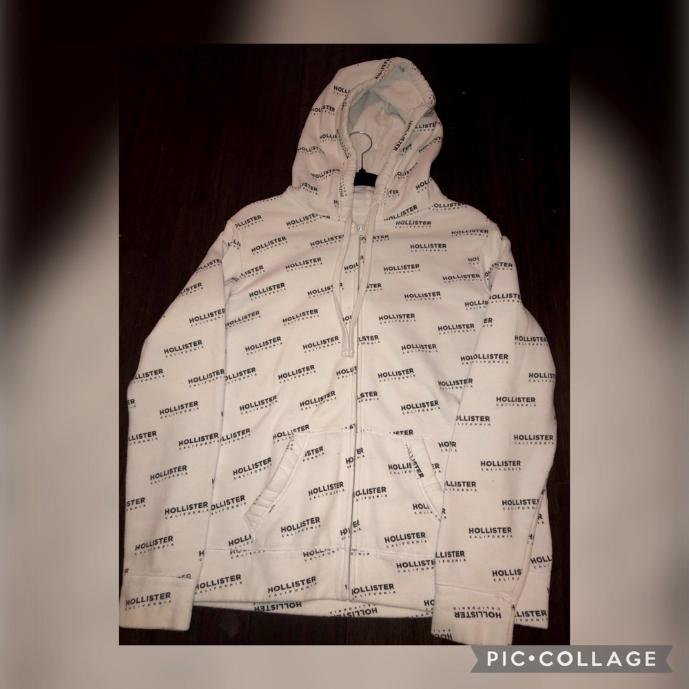 Hollister white and black jacket in size large.